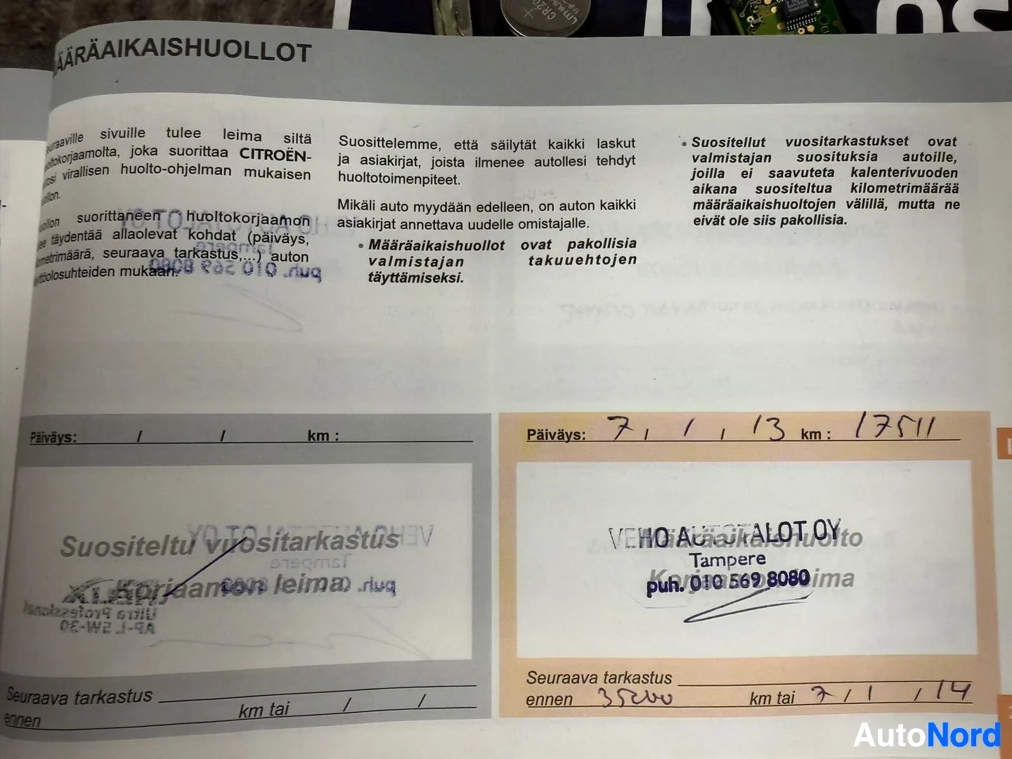 Asiakirja: Paperi joka sisältää suomenkielisiä määräaikaishuolto-ohjeita ja huoltohistorian merkintöjä.