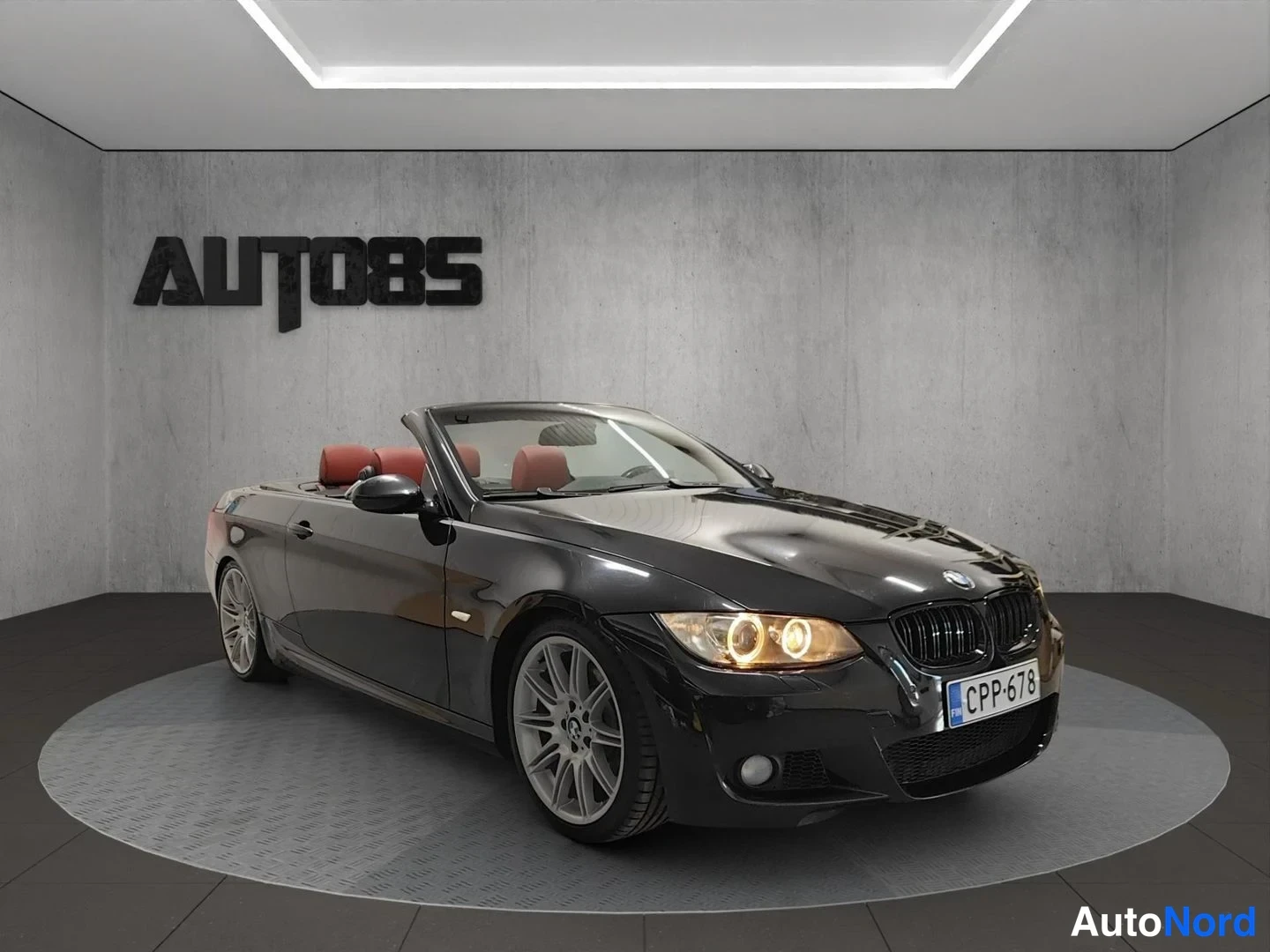 Musta BMW 335i 2008, etuviisto, keula oikealle, kuva 4