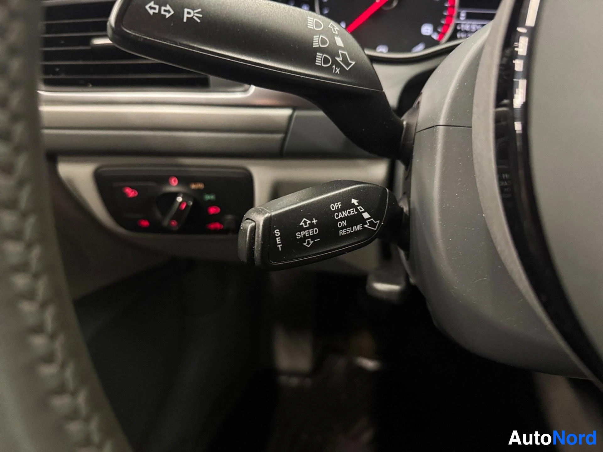 Turn signal and cruise control stalks on steering column