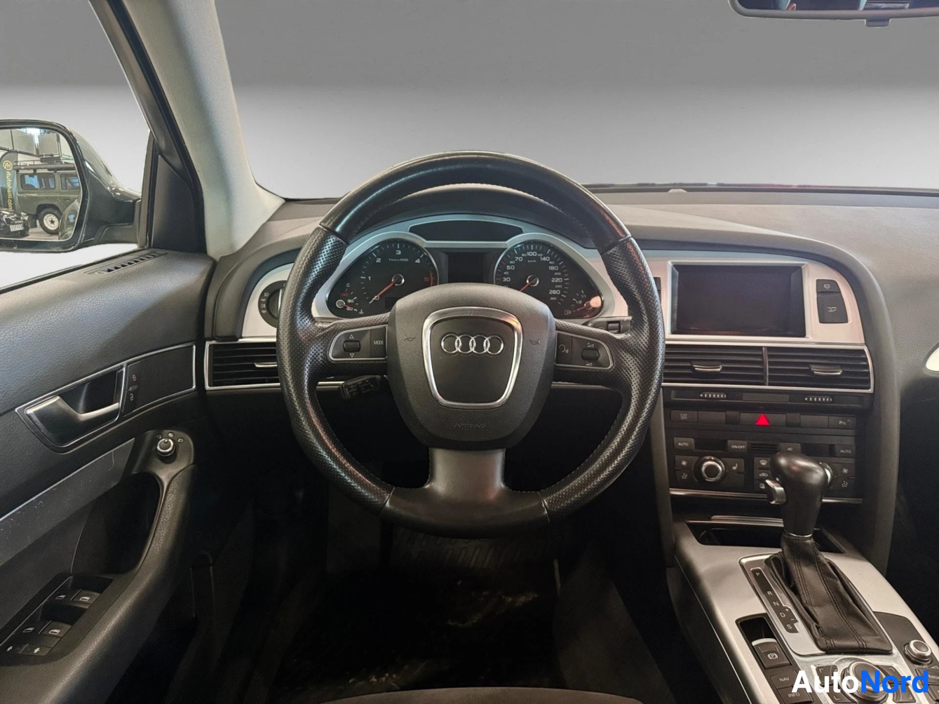 Dashboard with Audi steering wheel, instrument cluster and center console