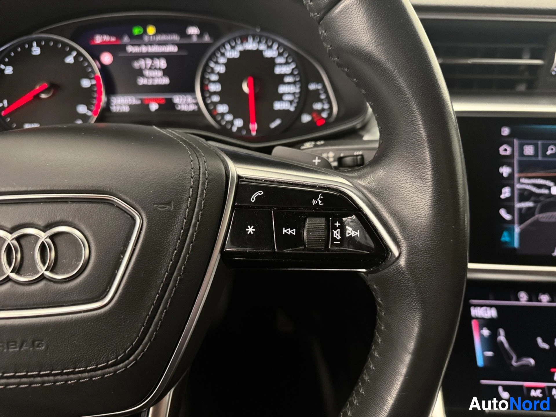 Audi steering wheel with leather grip and instrument cluster display