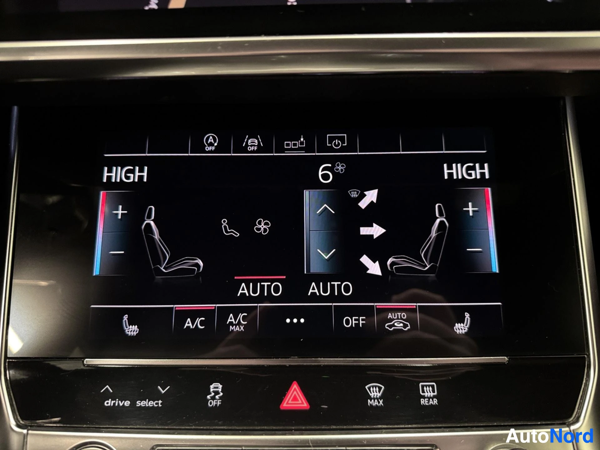 Climate control and seat heating adjustment panel on infotainment display