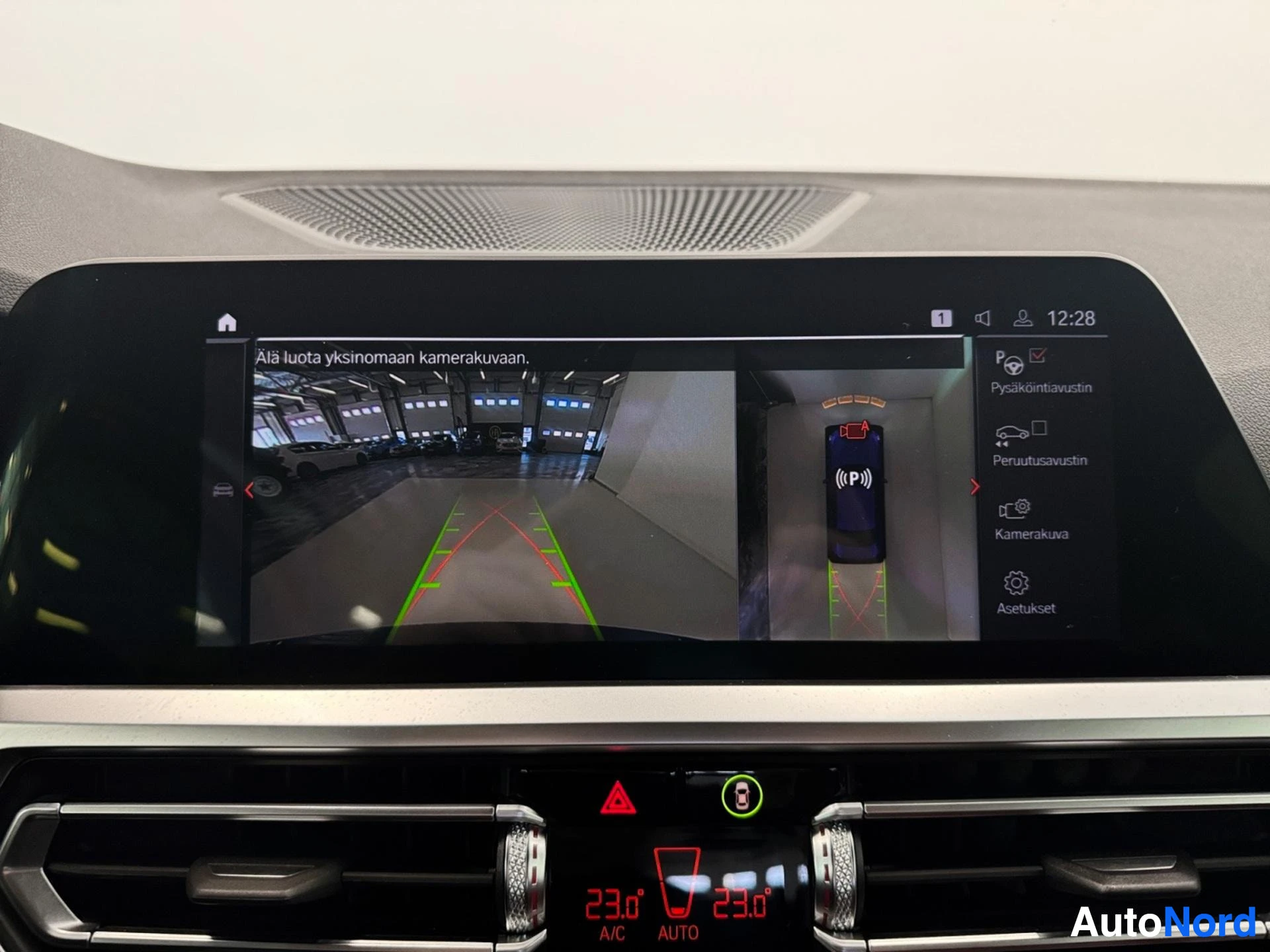 Rear and surround view cameras displayed on infotainment screen