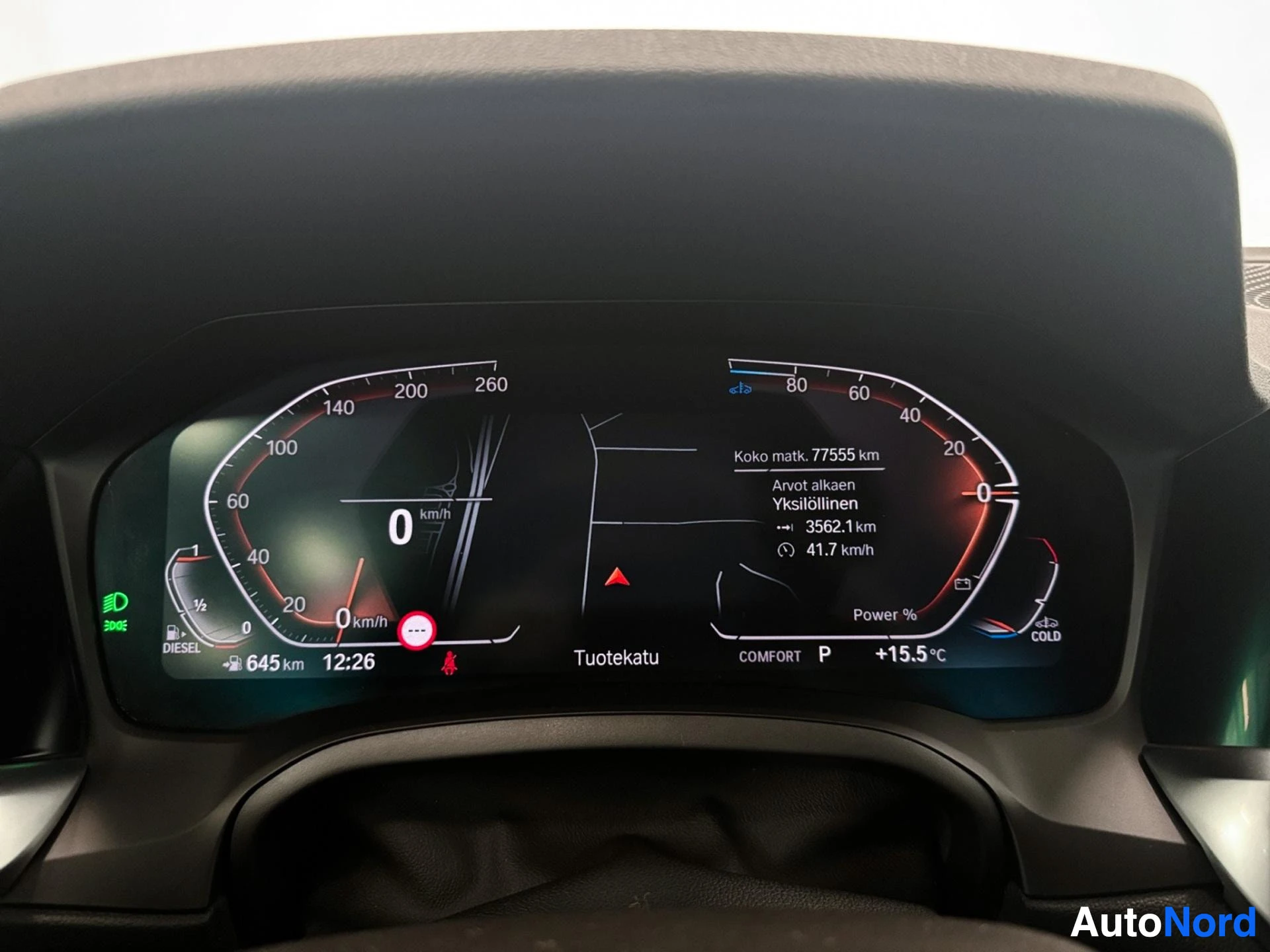 Digital instrument cluster displaying speedometer, fuel level and vehicle information
