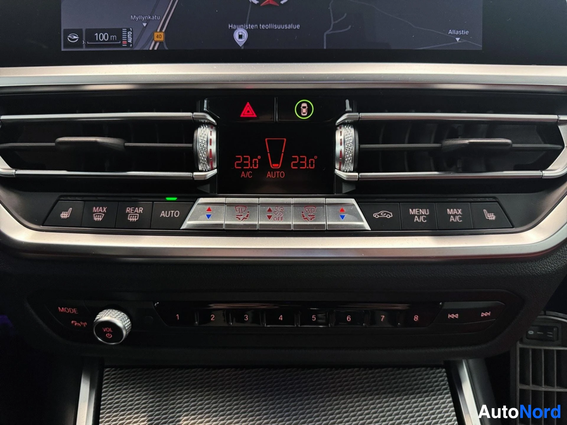 Climate control panel with temperature display and automatic settings