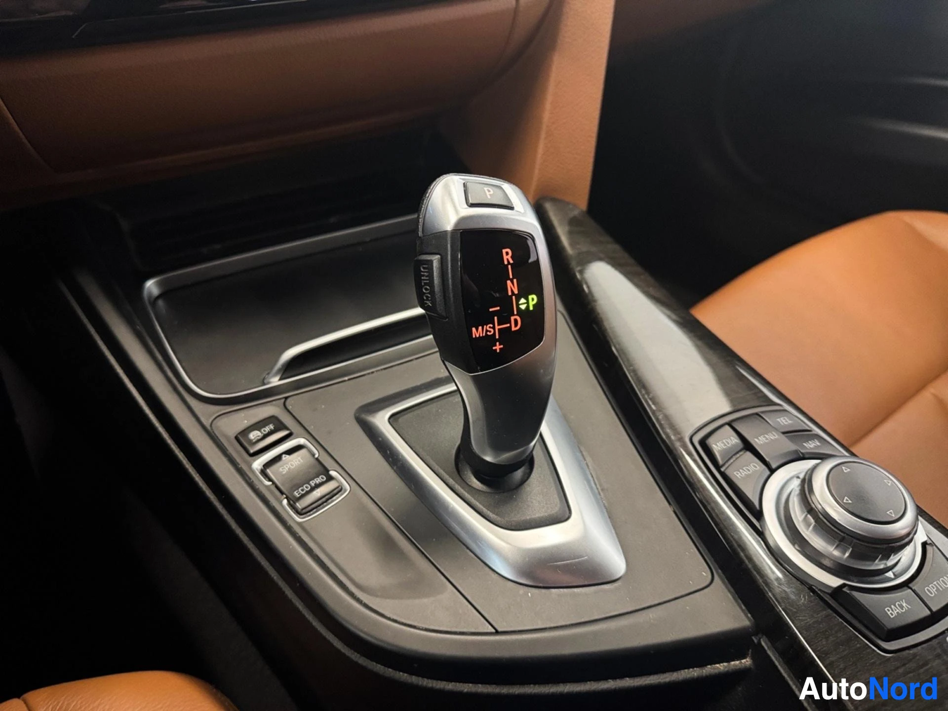 Automatic transmission shifter and center console with leather trim