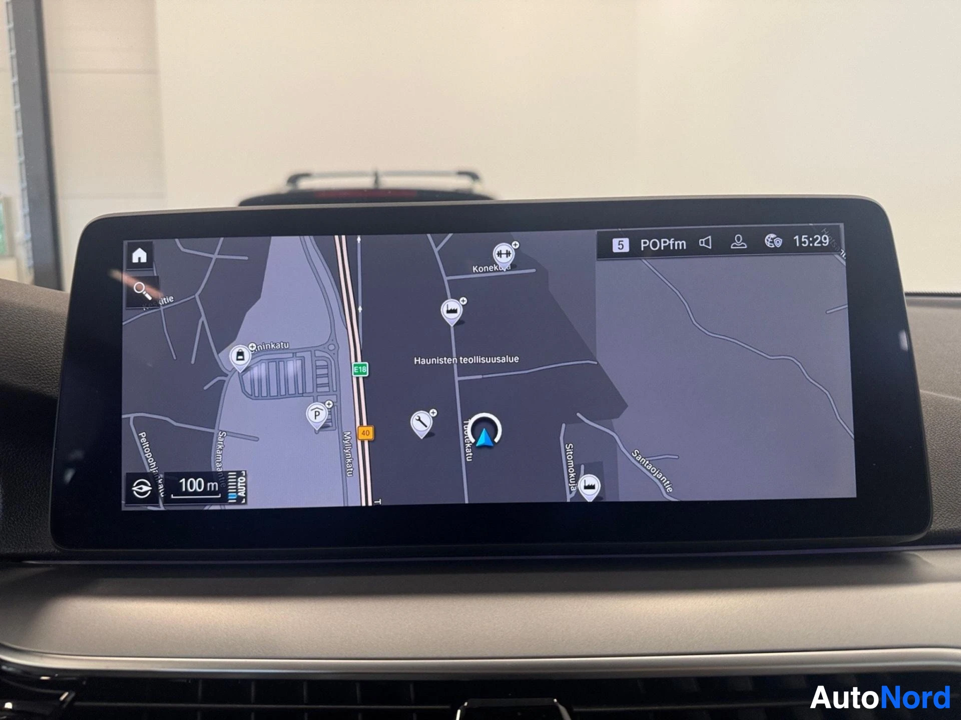 Navigation display showing map with Finnish text and location markers