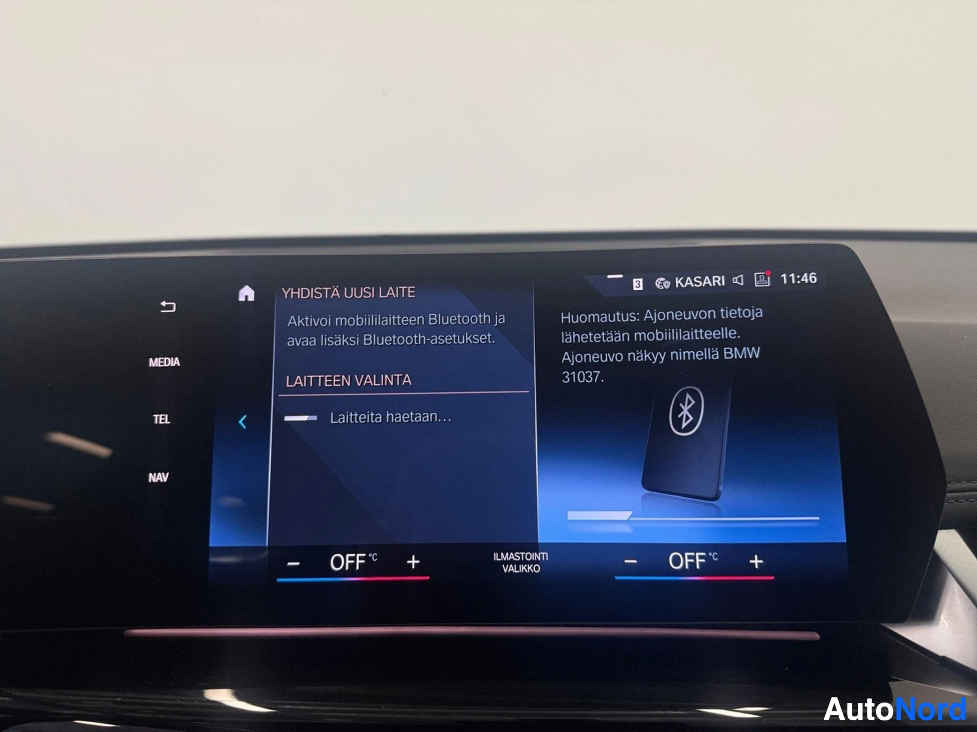 Infotainment system showing Bluetooth connectivity and device pairing information