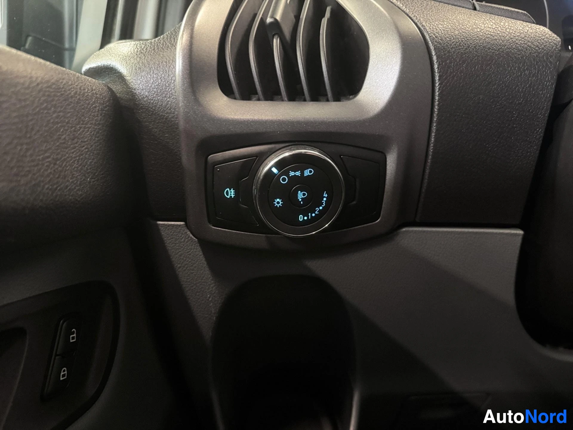 Steering wheel with illuminated multifunction controls and lights
