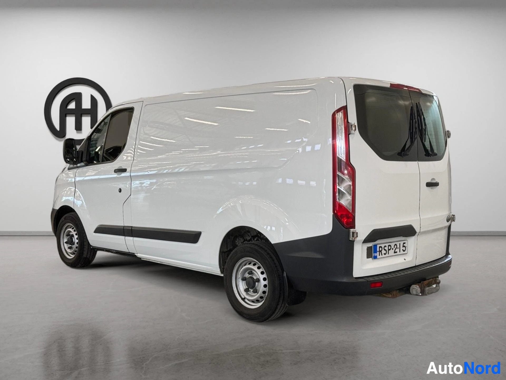 White van three-quarter rear view with driver's door open