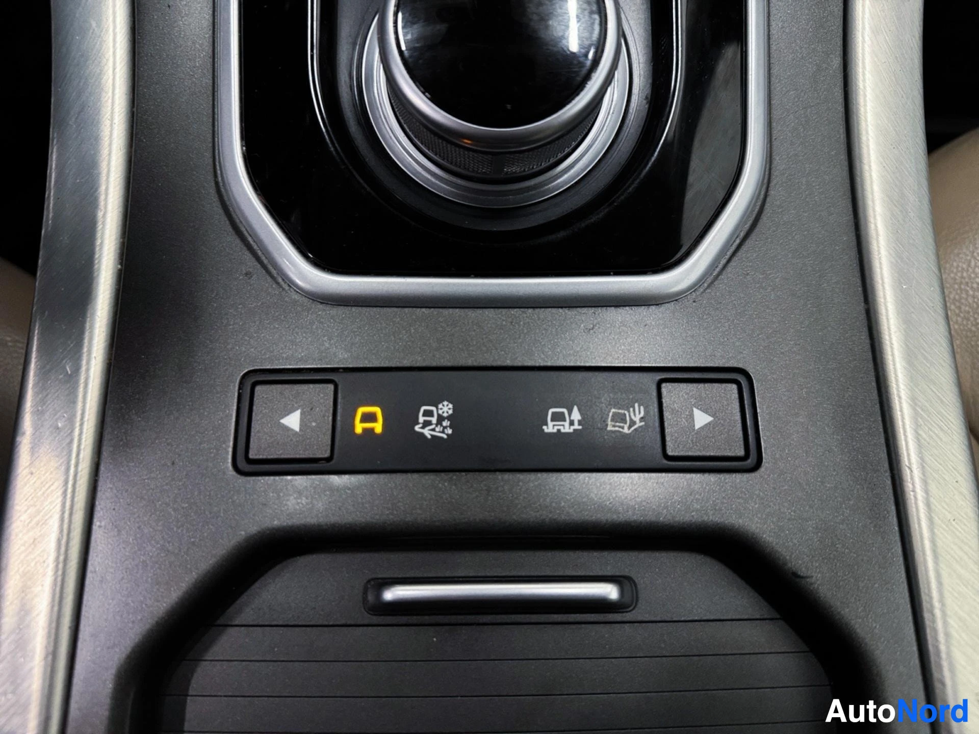 Interior center console with camera display and vehicle control buttons