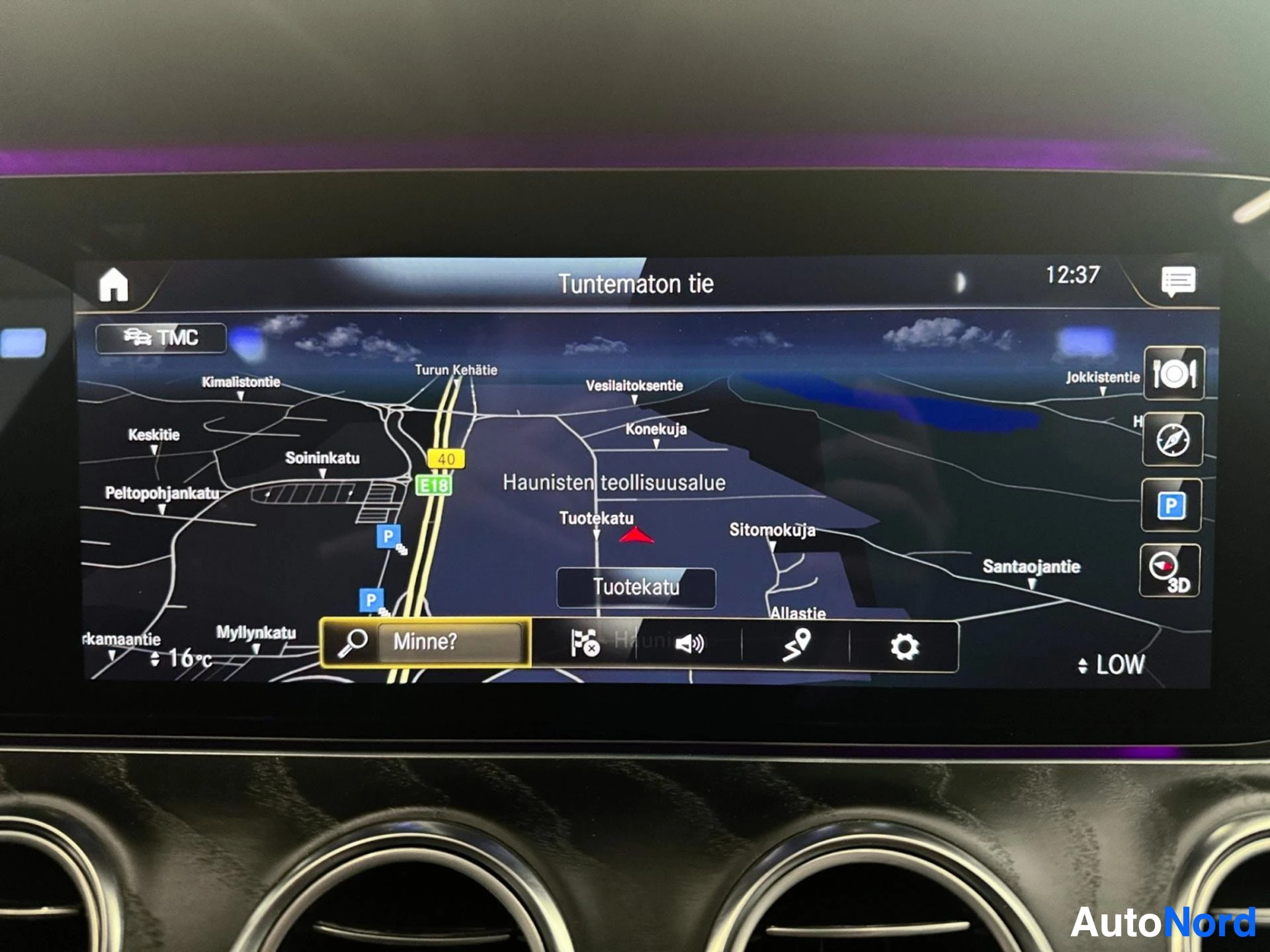 Infotainment display showing navigation map with Finnish location names