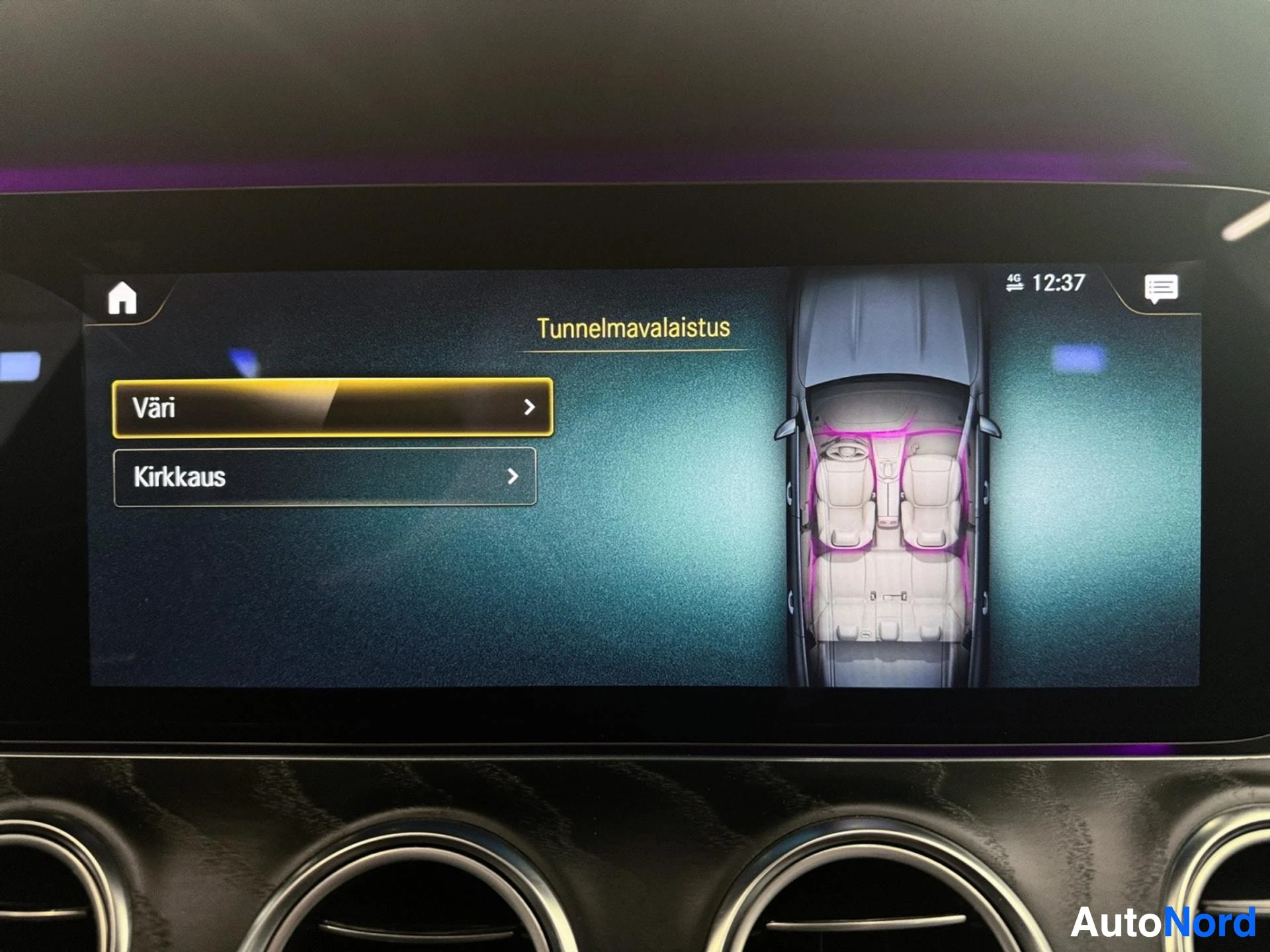 Infotainment display showing 360-degree parking camera view with menu options