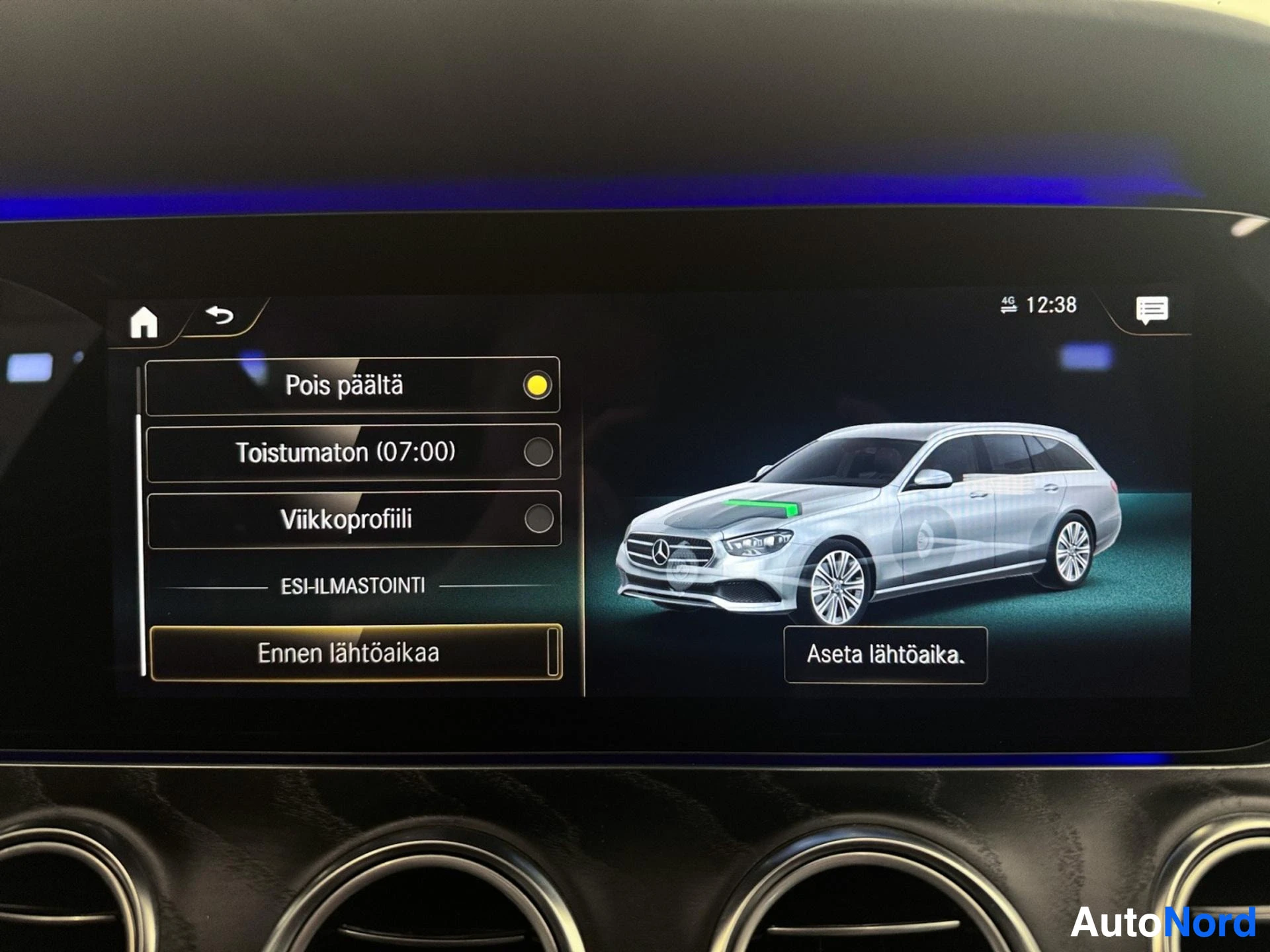 Center console display with driving assistance menu and vehicle illustration