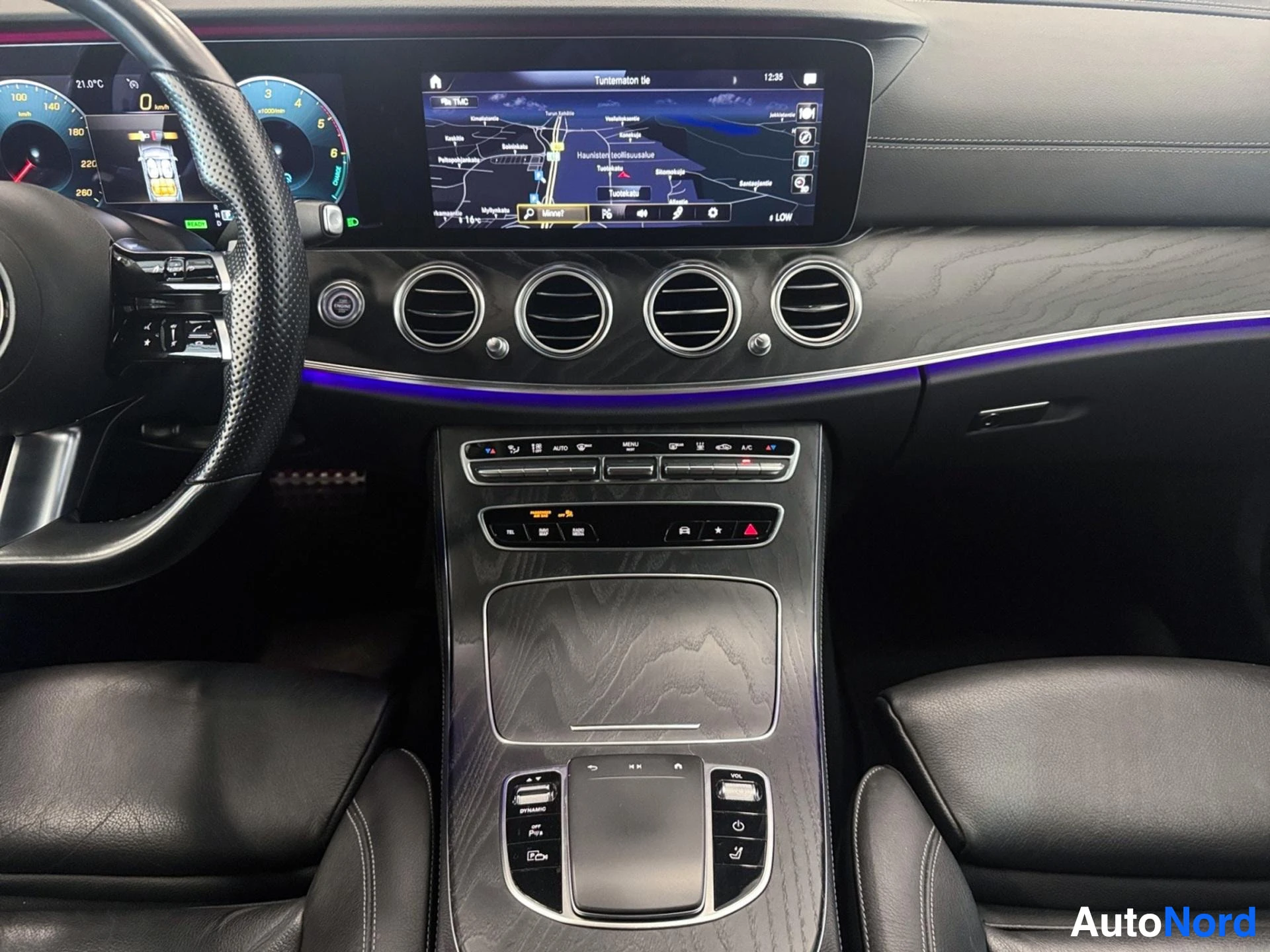 Center console with navigation screen, climate controls, and gear selector