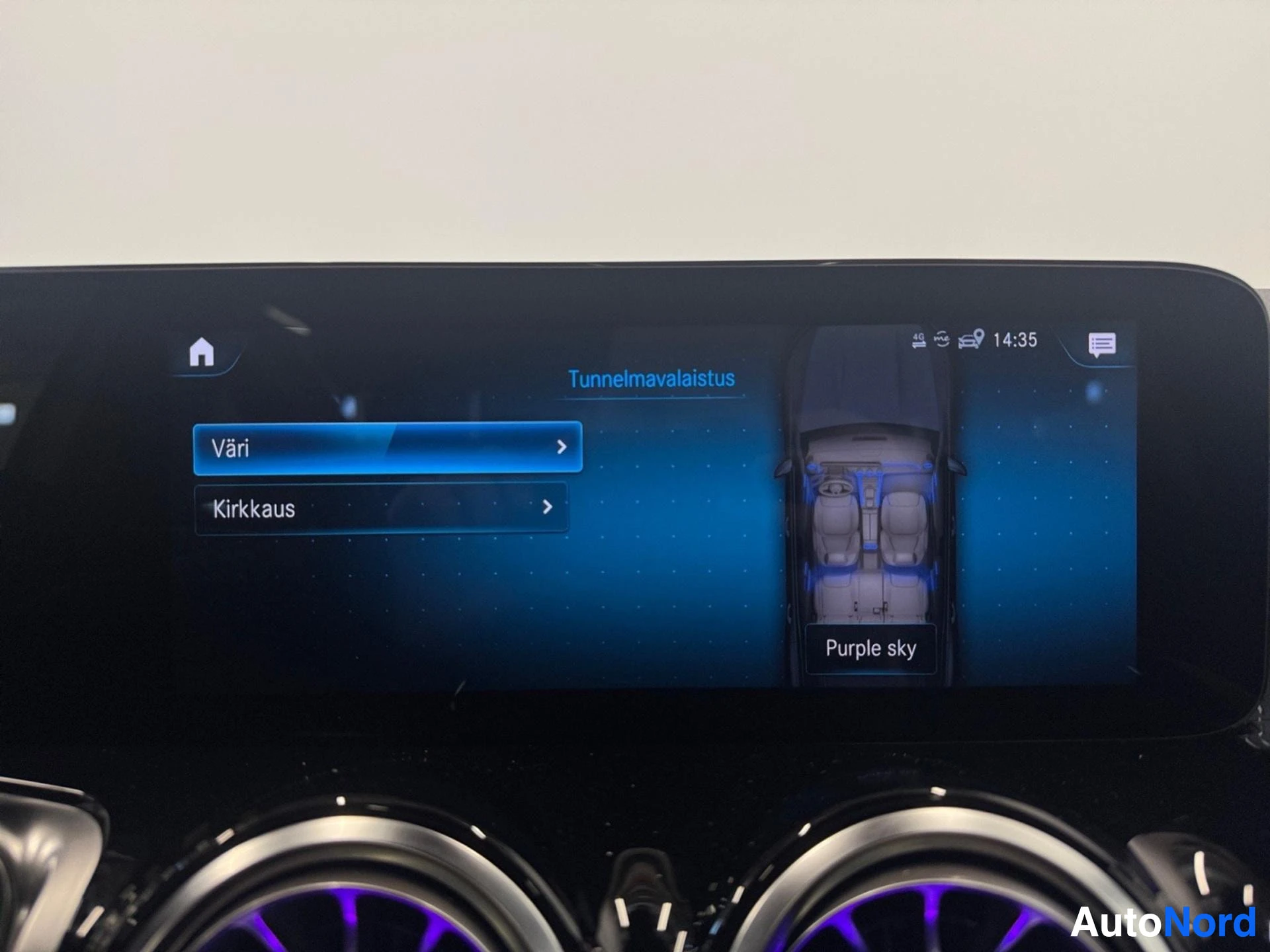 Infotainment screen showing color palette selection with purple and interior layout display