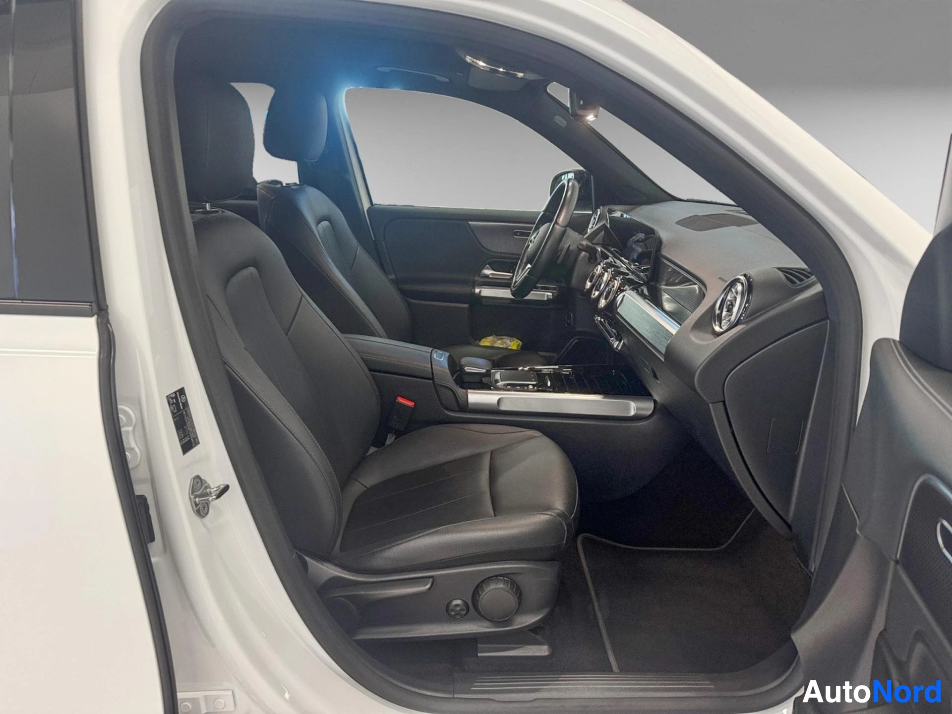 Center console and dashboard with touchscreen display and leather upholstery