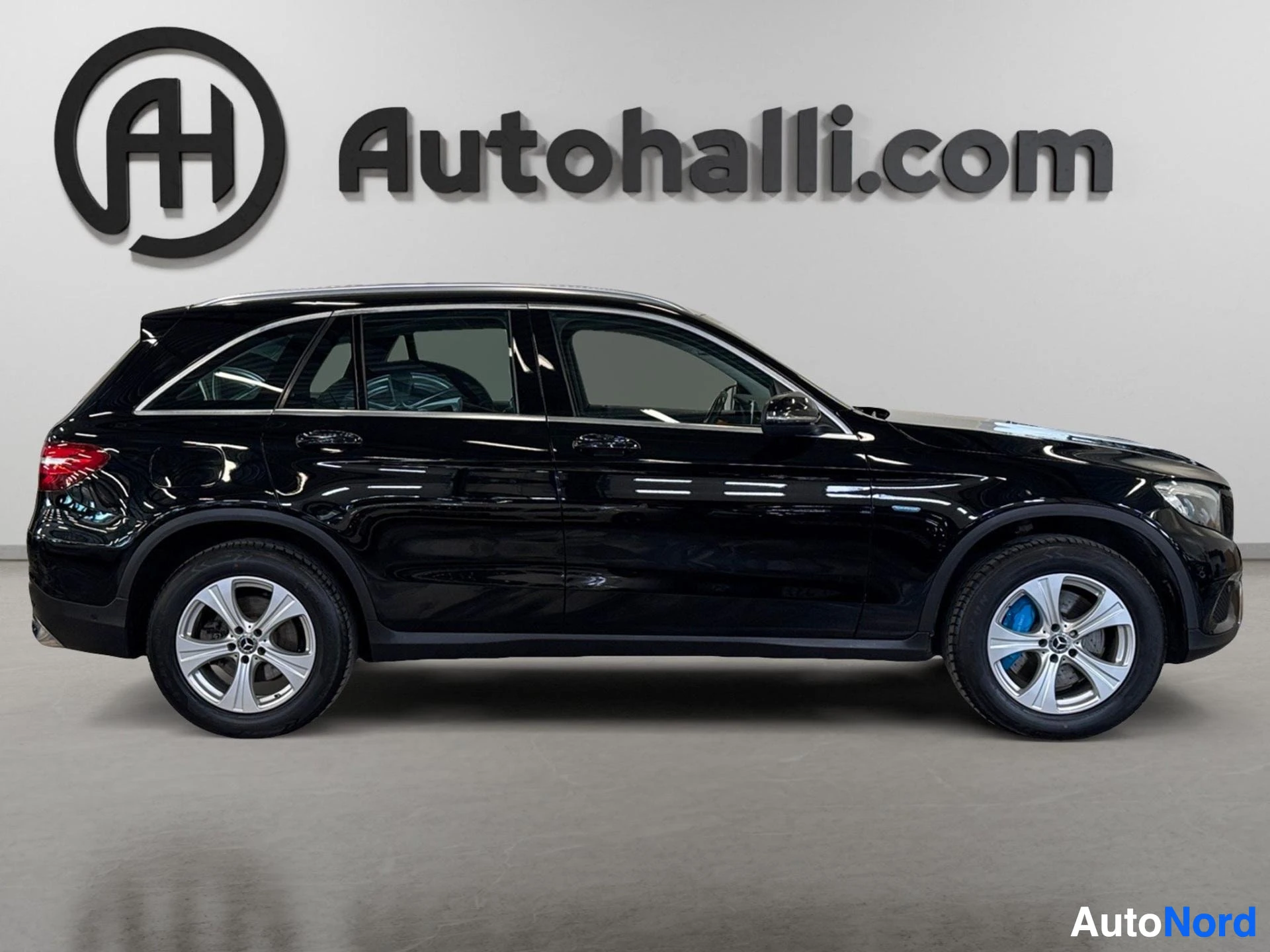 Black Mercedes-Benz SUV shown from the side with alloy wheels