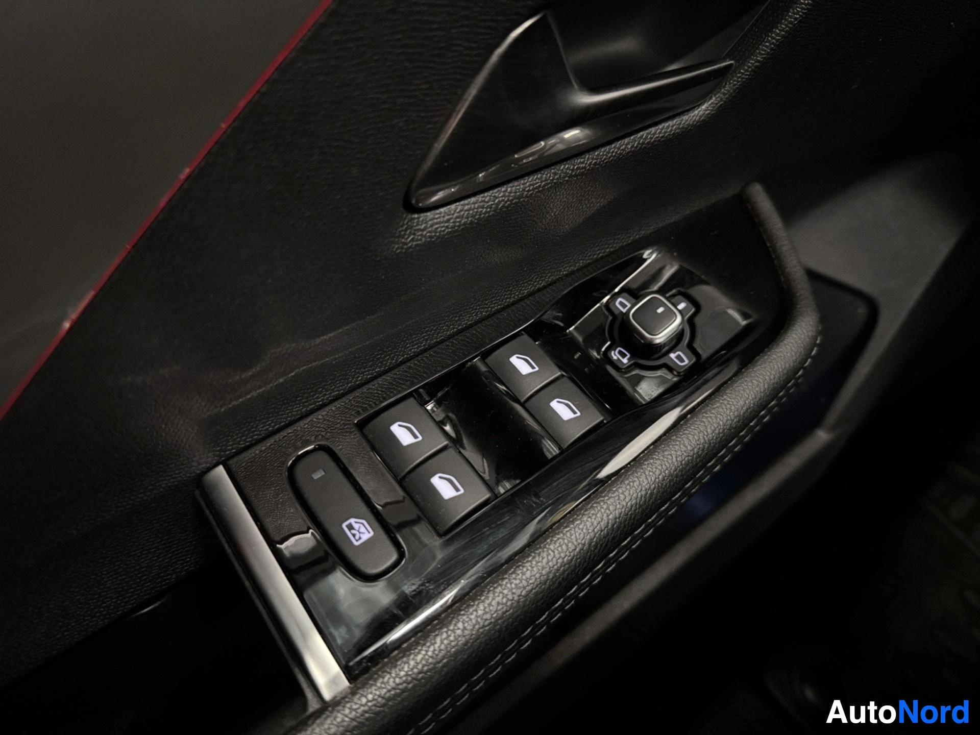 Door panel with window controls and power buttons