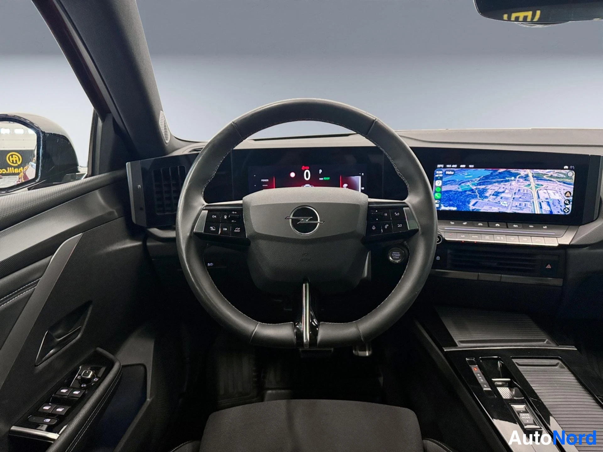 Dashboard with steering wheel, digital display and navigation screen