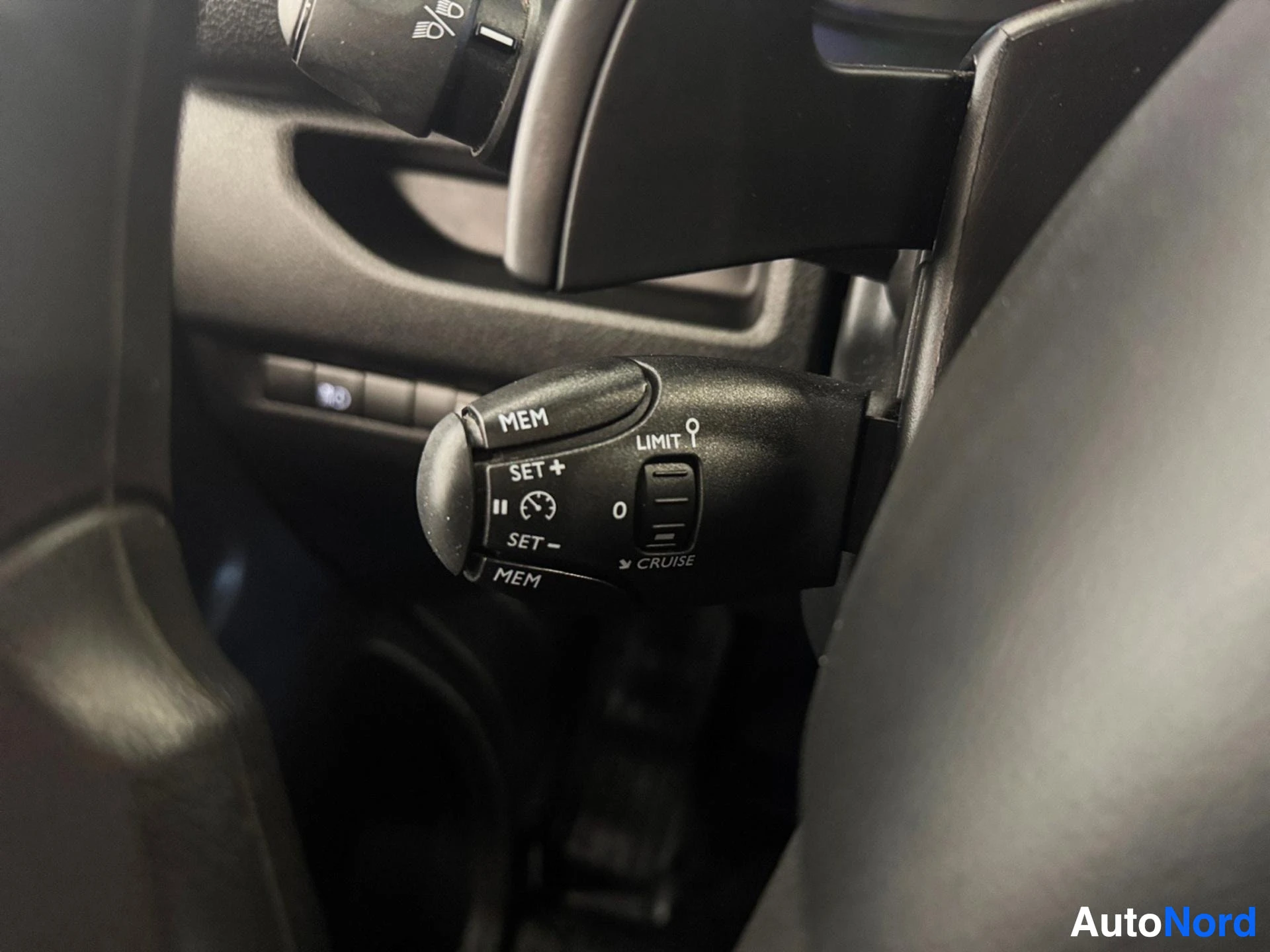 Cruise control stalk with memory and limit buttons on steering column