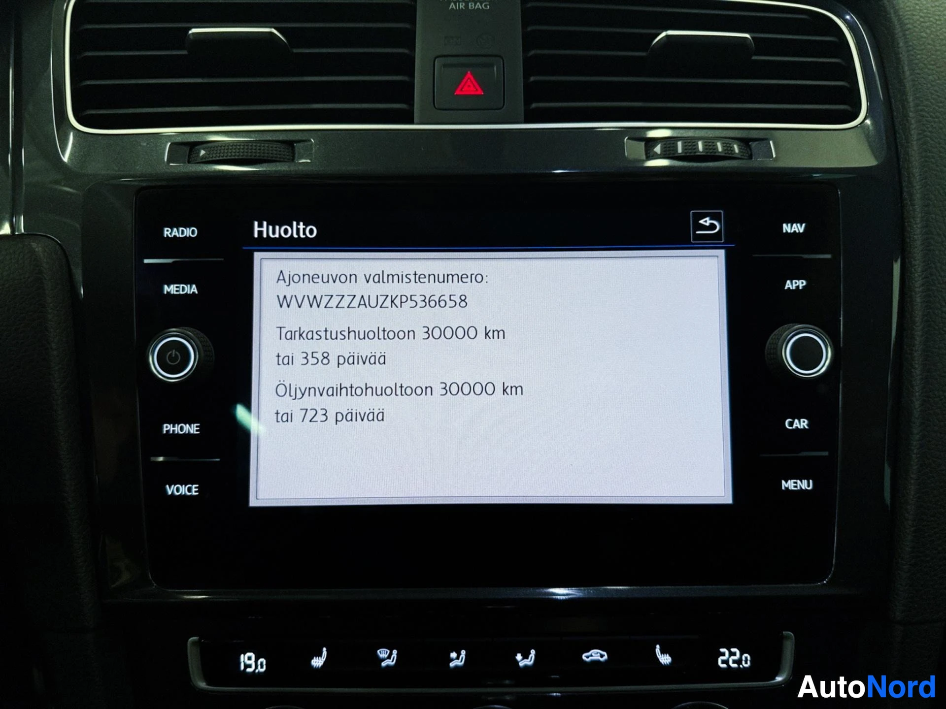Dashboard touchscreen displaying vehicle information and identification number