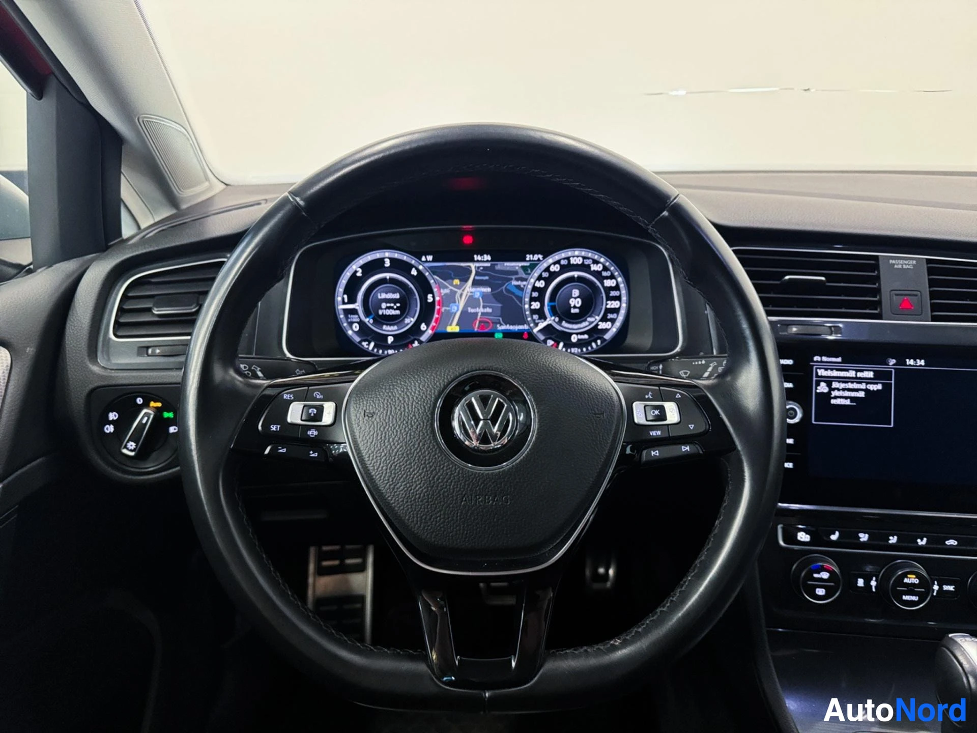 Steering wheel and upper dashboard with digital instrument display and controls