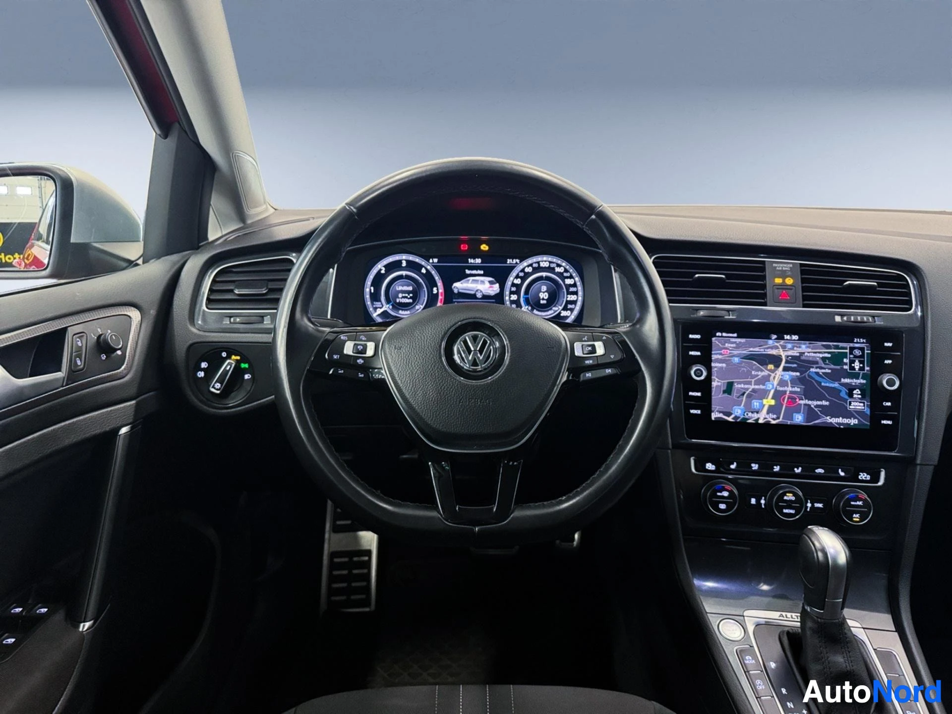 Volkswagen Golf dashboard with steering wheel, digital display and touchscreen infotainment system