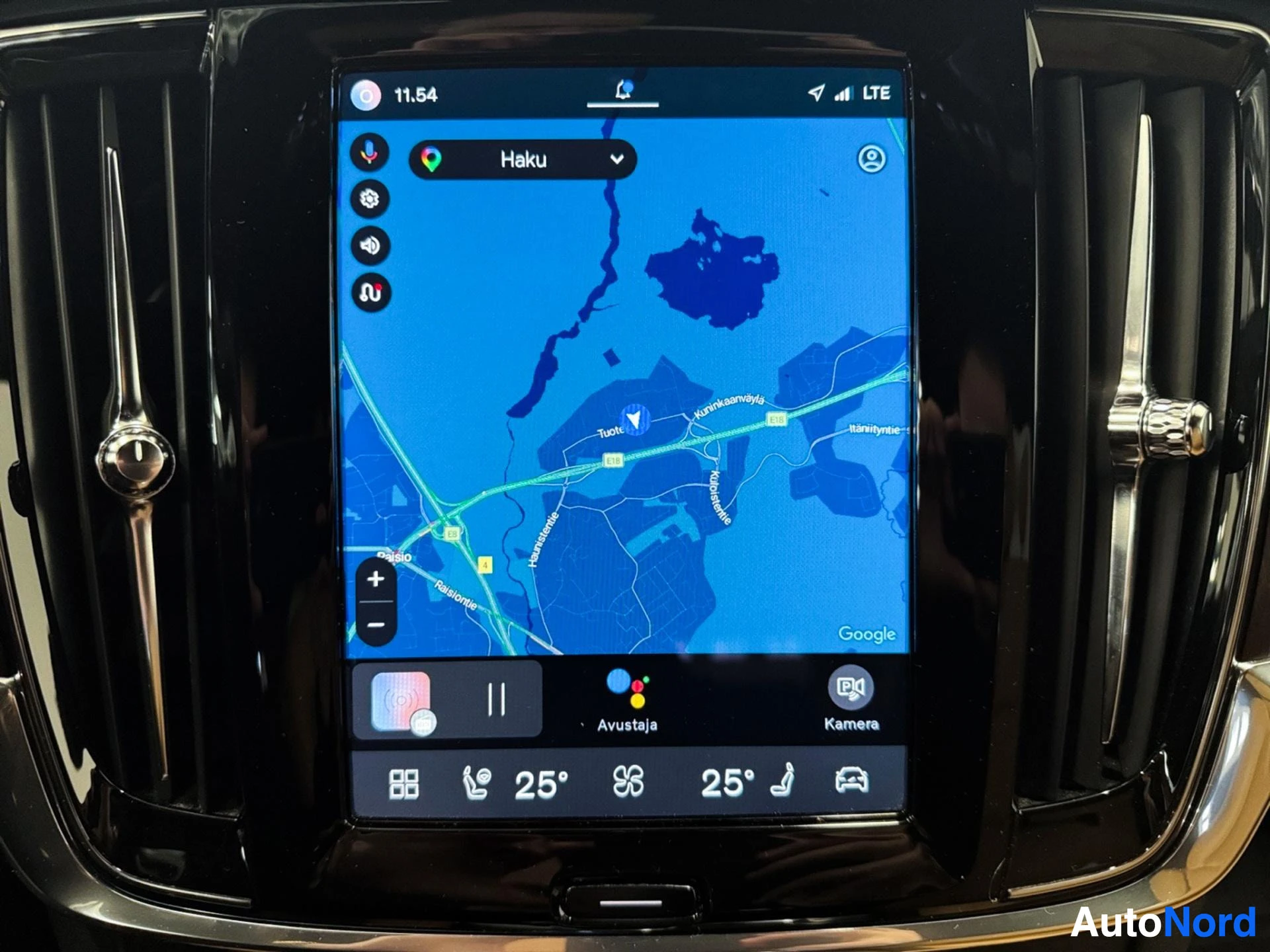 Touchscreen infotainment system displaying navigation map with Google Maps