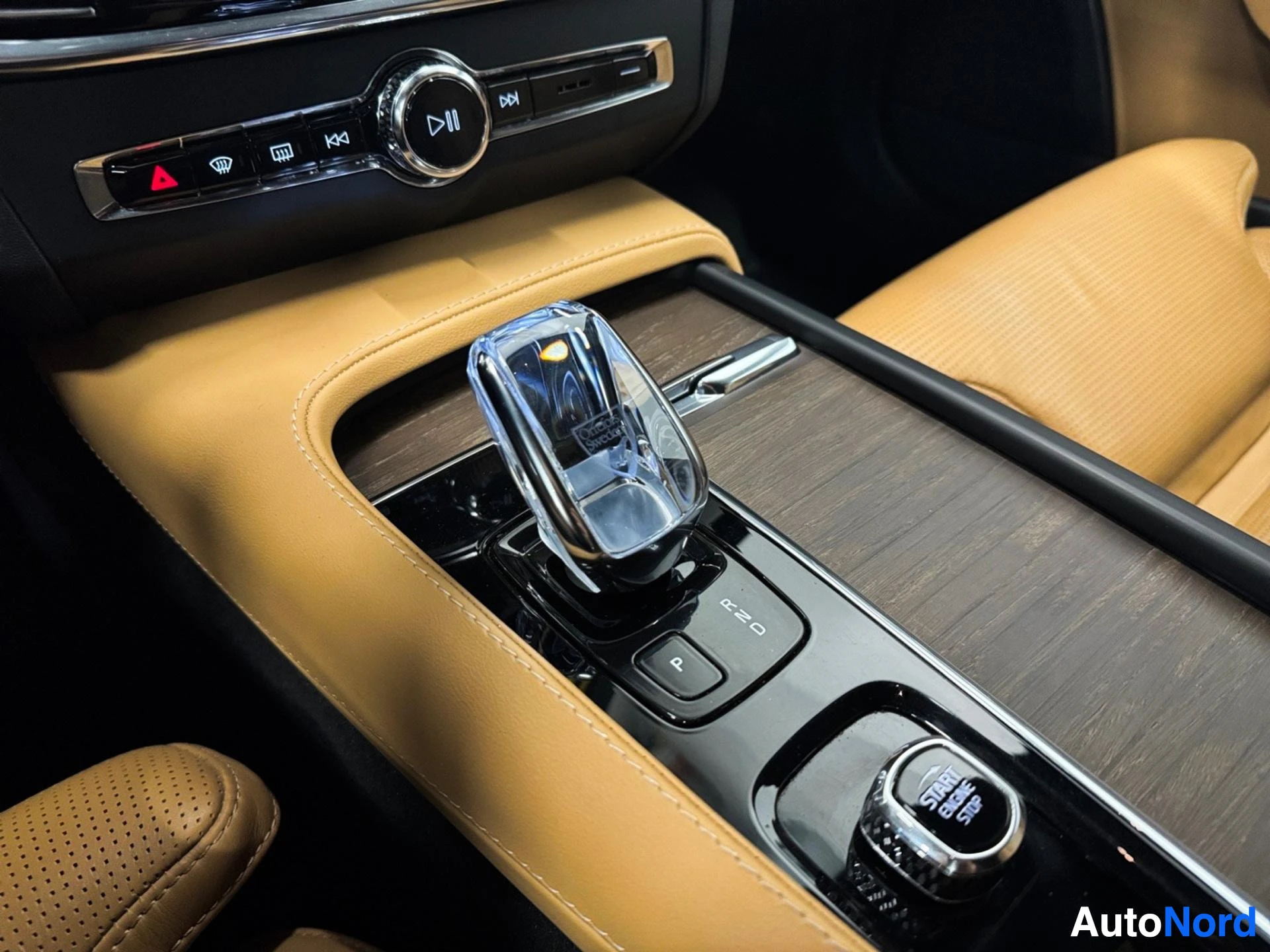 Center console with automatic transmission lever and tan leather seats