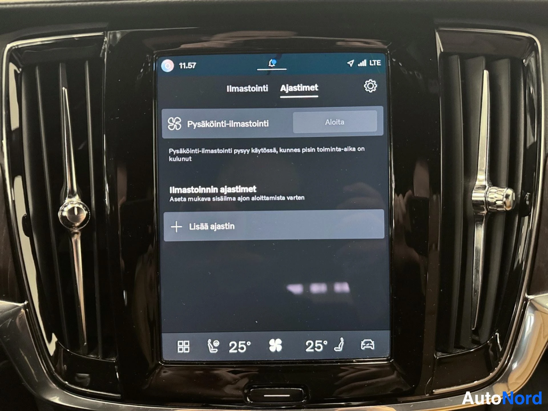 Touchscreen displaying air conditioning settings and adjustment options.