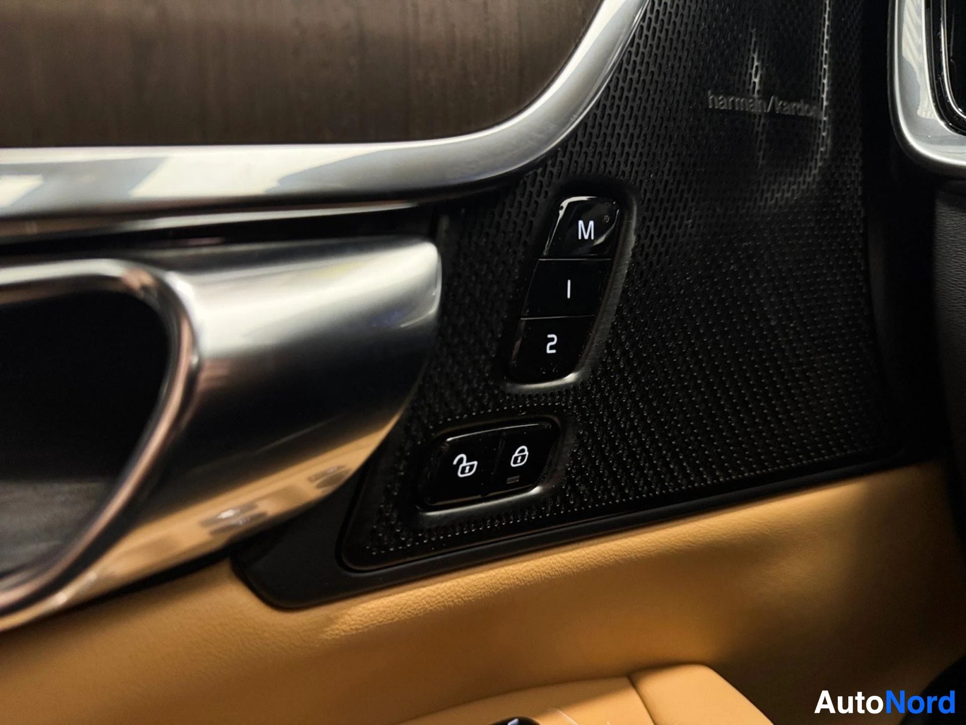 Door panel controls showing preset buttons and window controls