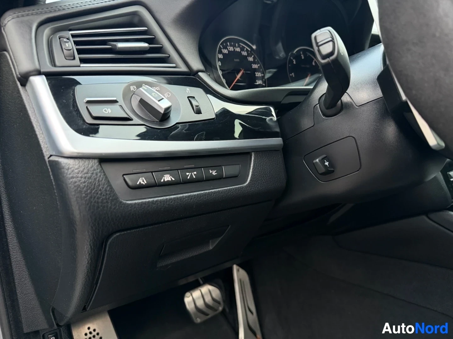 Steering wheel and dashboard with instrument cluster and climate controls