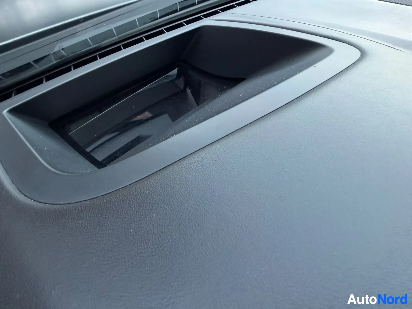 Side air vent detail on dashboard panel