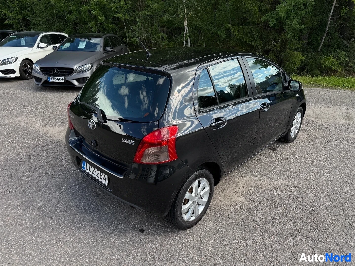 Black Toyota Yaris rear three-quarter view showing Varis badge
