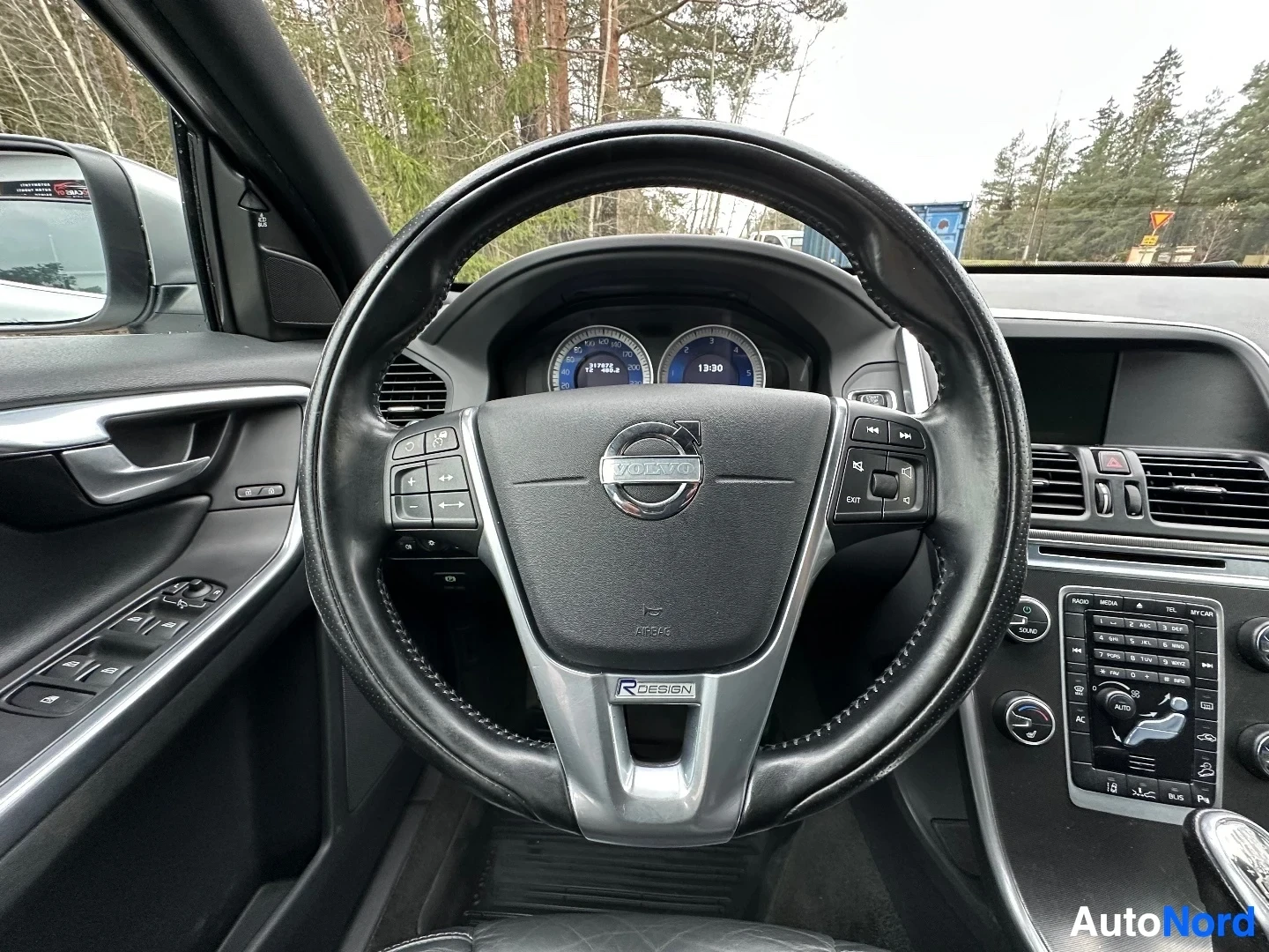 Steering wheel and dashboard instrumentation with R-Design trim detail