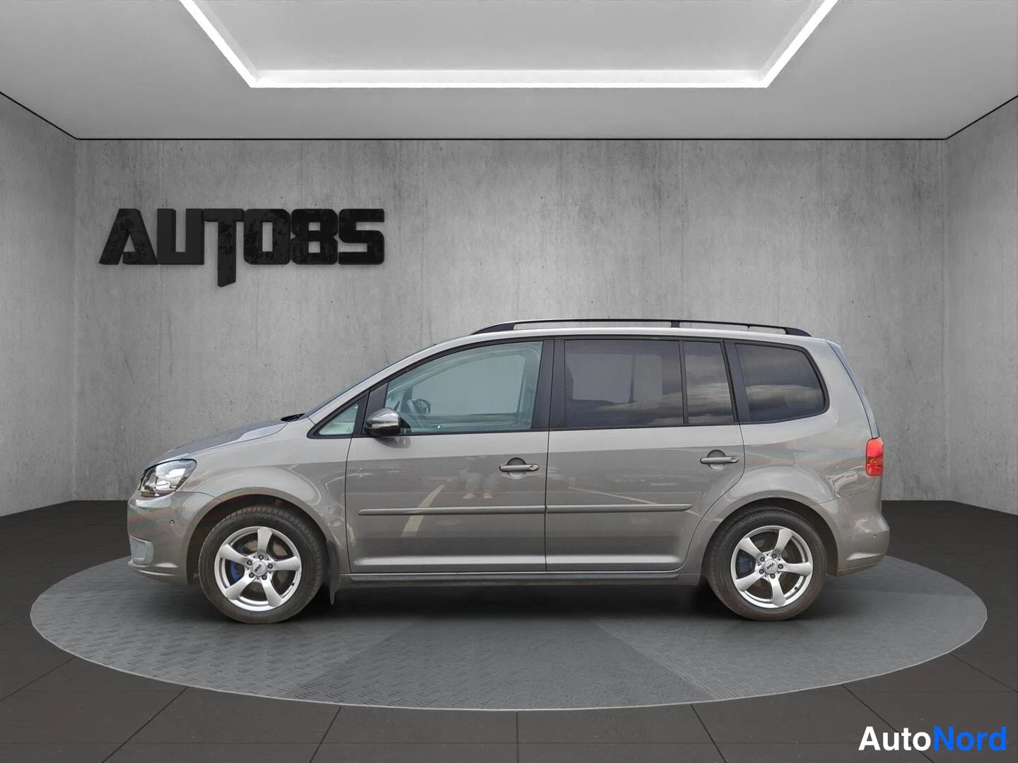 Ruskea Volkswagen Touran 2011, sivulta, kuva 4