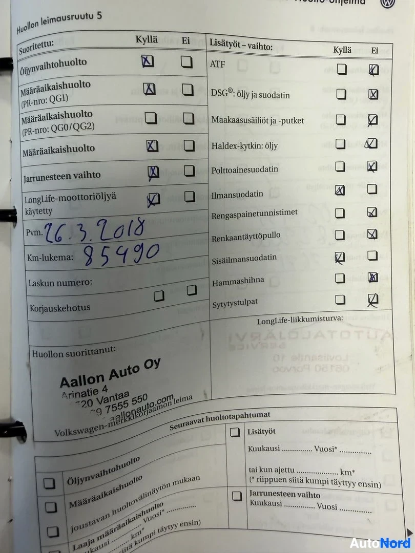 Asiakirja: Volkswagen Osa 1.1 huolto-ohjelma -dokumentti, jossa täytetty huoltoväli 5 -taulukko. Näkyvillä käsin kirjoitettuja merkintöjä, joissa pvm. 26.3.2018, km-lukema