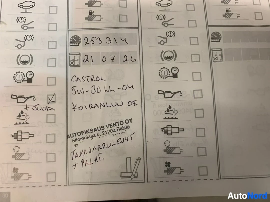 Asiakirja: Huoltokirjan sivusto, jossa on käsinkirjoitettuja merkintöjä, ml. mittarilukema 253314 km, huolto 2107 km:n kohdalla, Castrol 5W-30 kh-04 öljy ja muita merkintö