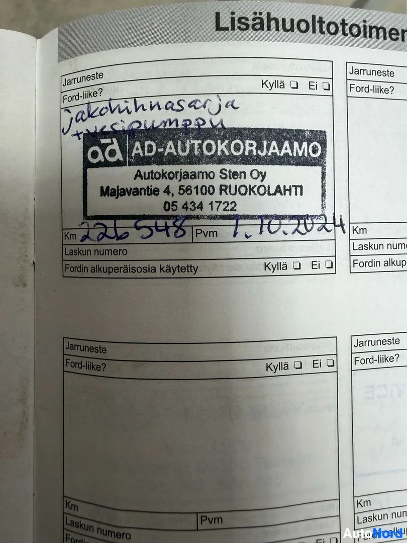 Asiakirja: Lisähuoltotoimi-dokumentti, jossa AD-AUTOKORJAAMO-leima ja käsinkirjoitettuja merkintöjä