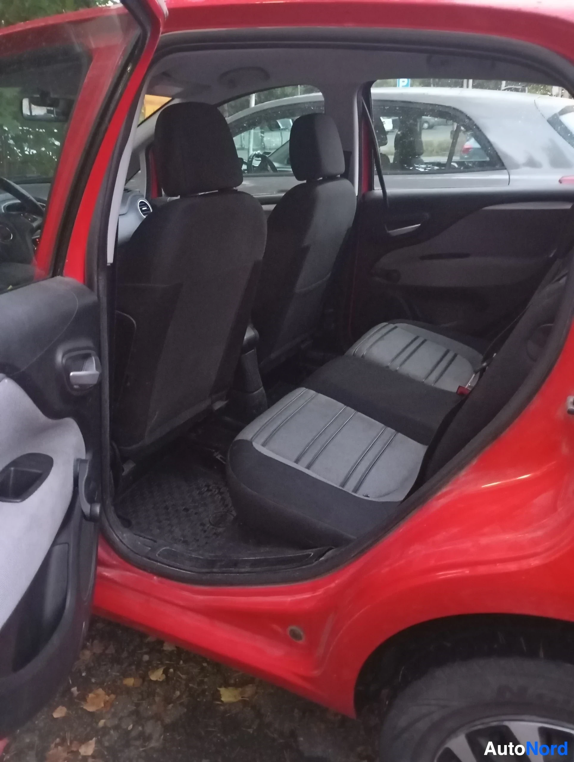 Punainen Fiat Punto Evo 2011, ulkokuva 13 – Vantaa