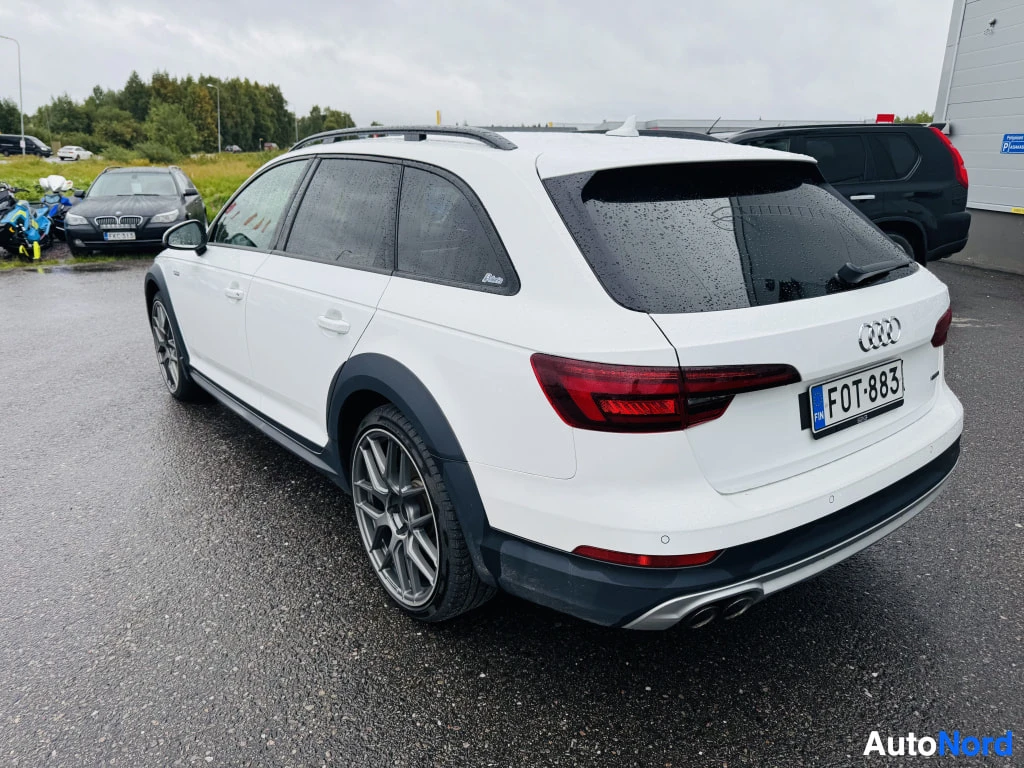 Takaviisto: Valkoinen farmariauto takaa viistosti vasemmalta, Rekisteritunnus