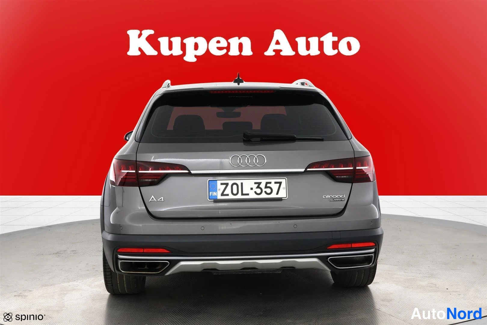 Takaa: Audi A4 allroad takaa kuvattuna, rekisteritunnus Z0L-357, punainen tausta