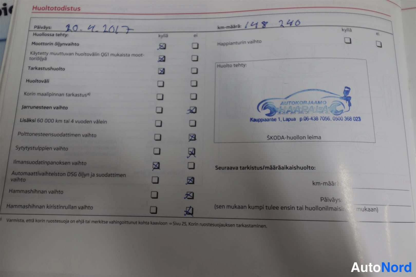 Asiakirja: Skoda-huoltotodistus: huolto tehty 20.4.2017, km-määrä 148240, leima Autokorjaamo Haapala, Lapua.
