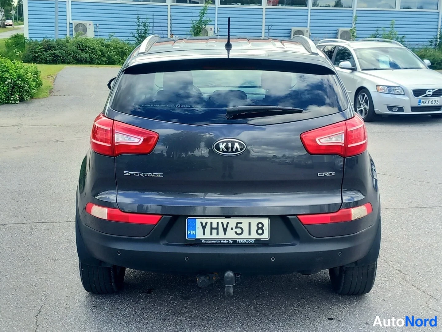 Takaa: Kia Sportage, suora takanäkymä, takaluukun Sportage- ja CRDi-merkit, rekisteri, vetokoulu
