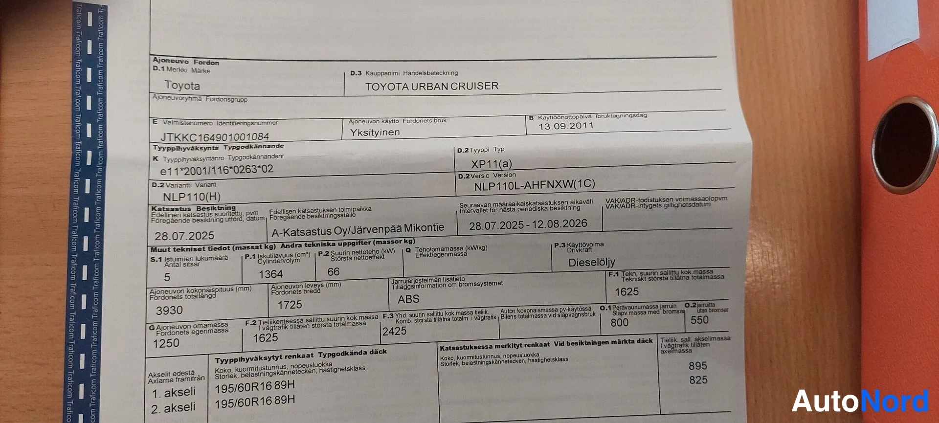 Muu: Rekisteriote asiakirja Toyota Urban Cruiser -autolle, jossa näkyvät ajoneuvon tunnistetiedot, NLP110H ja NLP110L-AHFNXW(1C), XP11(a), ensimmäinen rekisteröinti