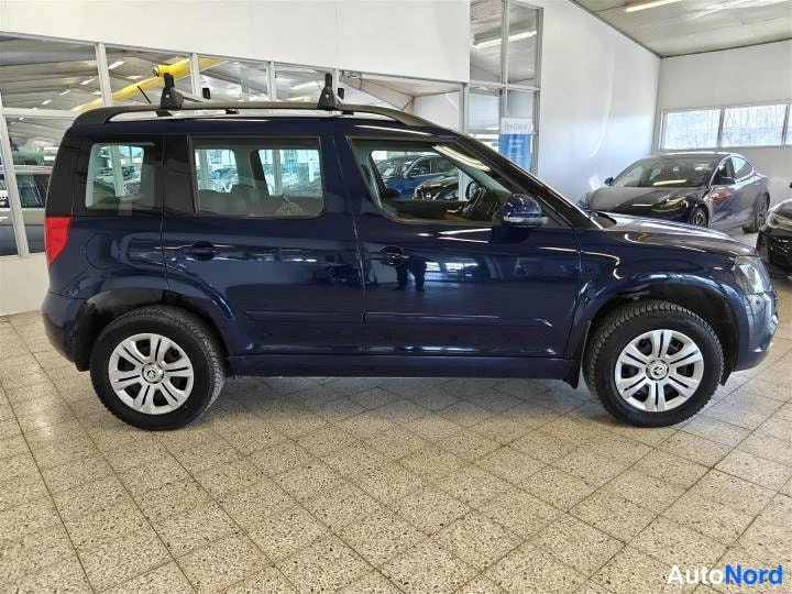 Sininen Skoda Yeti 2016, sivulta, kuva 3