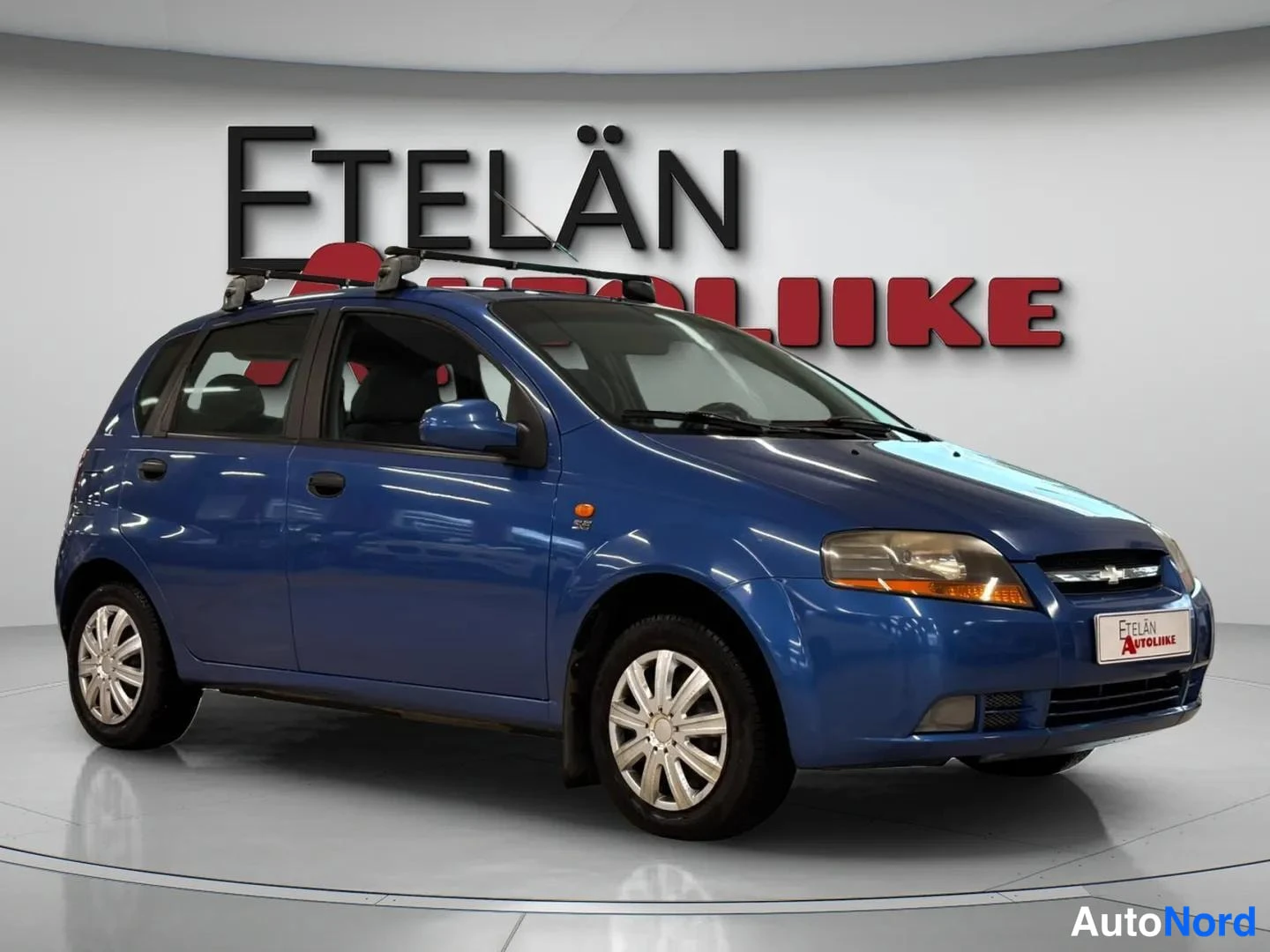 Sininen Chevrolet Kalos 2005, etuviisto, keula oikealle, kuva 2