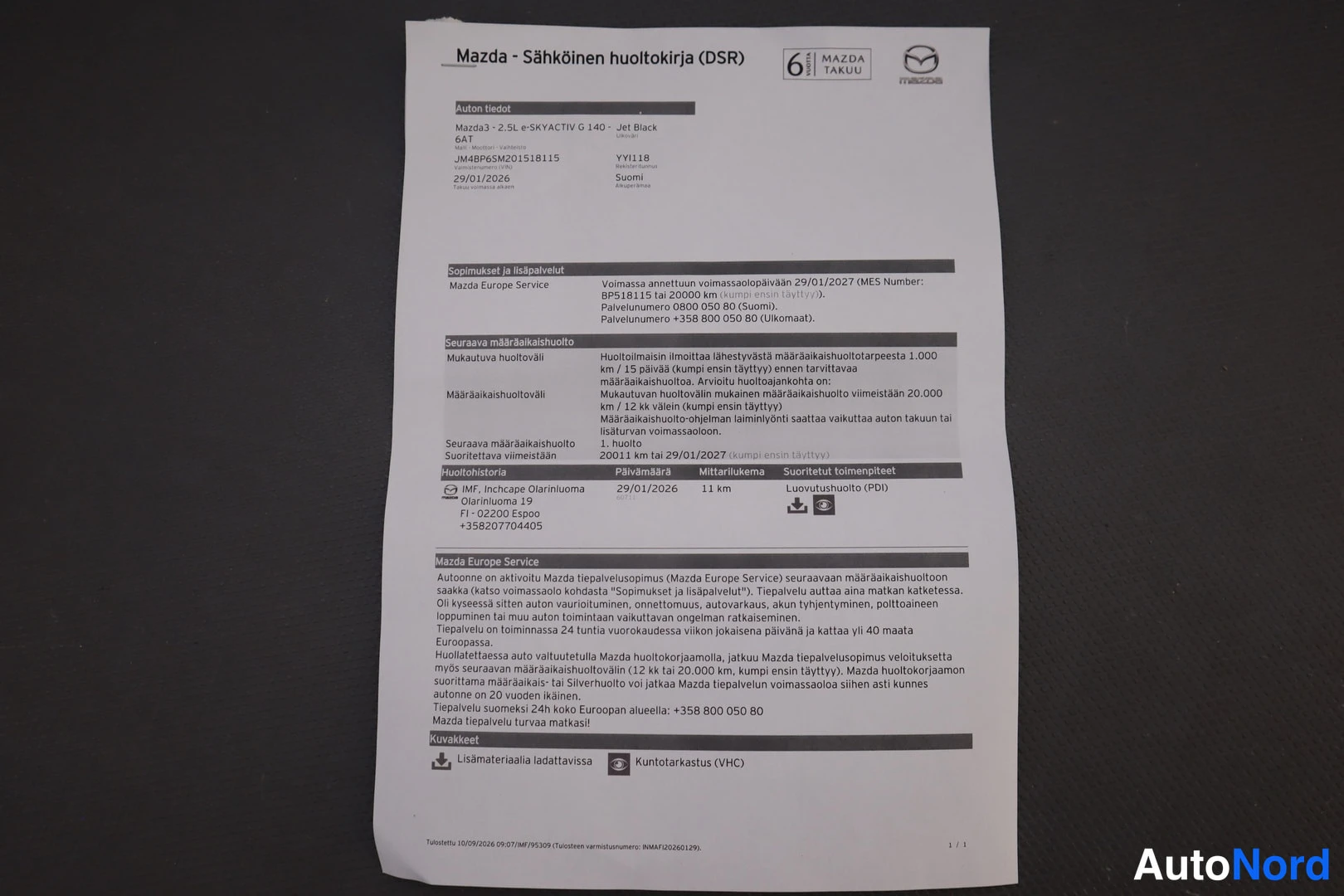 Asiakirja: Huoltokirjan ensimmäinen sivu (DSR). Tekstit: 'Mazda - Sähköinen huoltokirja (DSR)', 'Mazda | e-SKYACTIV G 140 | Jet Black', VIN JM4BP65M201518115, 'Seuraava mä