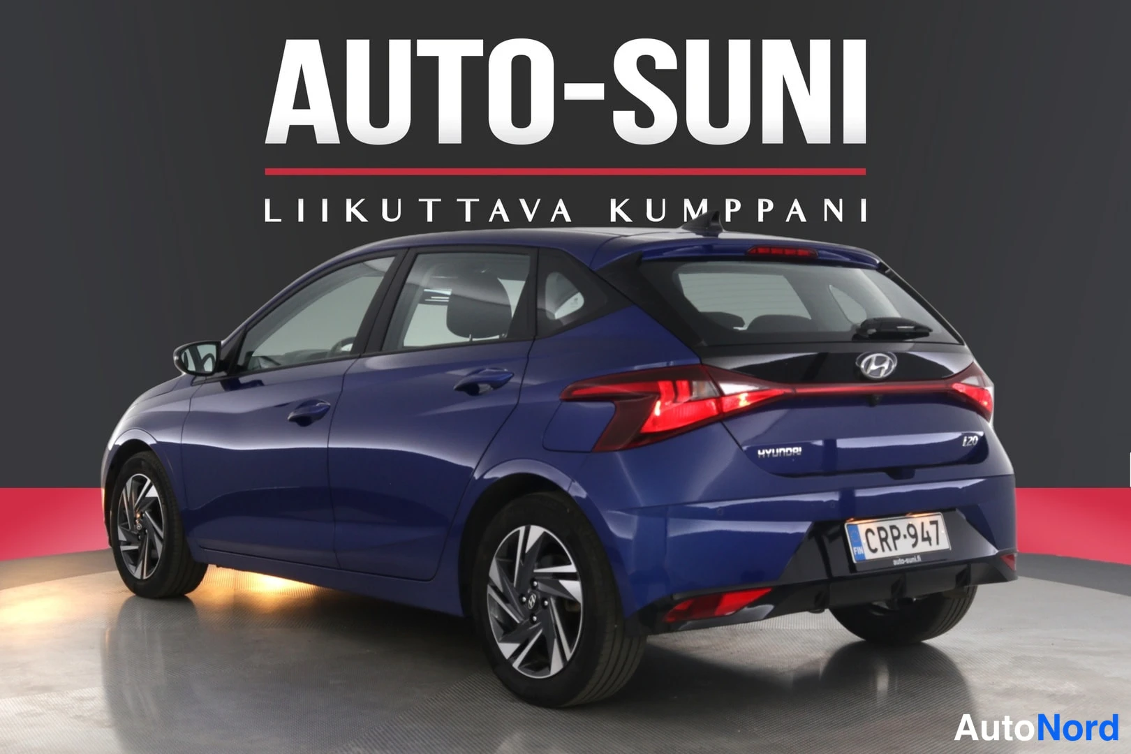 Takaviisto: Sininen Hyundai i20 -viistotakakuva, rekisterikilpi.